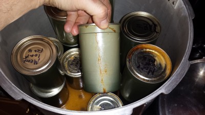This batch came out like all the other batches I have run, with cans that look fine, but that something leaked out of. Glass jars always leak too, but they haven't been rolled shut like these cans. It could be that my rollers aren't correct, even though the edge looks correct. 