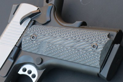 Enhanced Micro Pistol (EMP) from Springfield Armory The G10 grips on the .40.