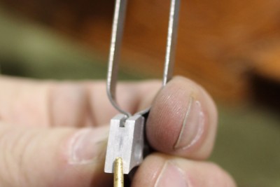 Trigger not fitted to gun binding on frame.