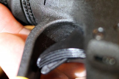 If you look closely you can see where the controls have been added behind the trigger. When the trigger safety moves, even slightly, it breaks a magnetic connection and the laser flashes.