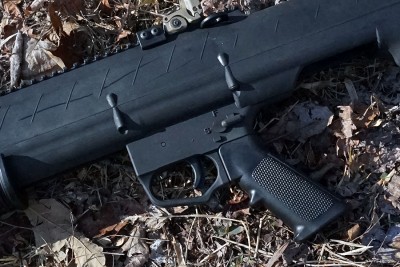 DIY Bullpup Kit for Mossberg 500 & Remington 870 But loading the gun itself isn't as easy as it is on a typical 500. Actuate the safety, flip it upside down, and fill it up.