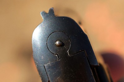 The rear sight. 