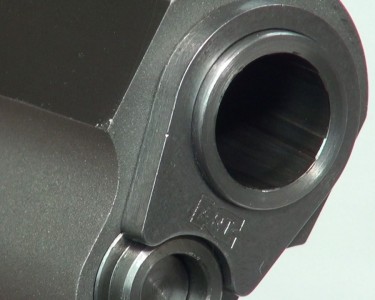 You'd better eat your spinach before you try to remove this barrel bushing. And you'll need a steel wrench!