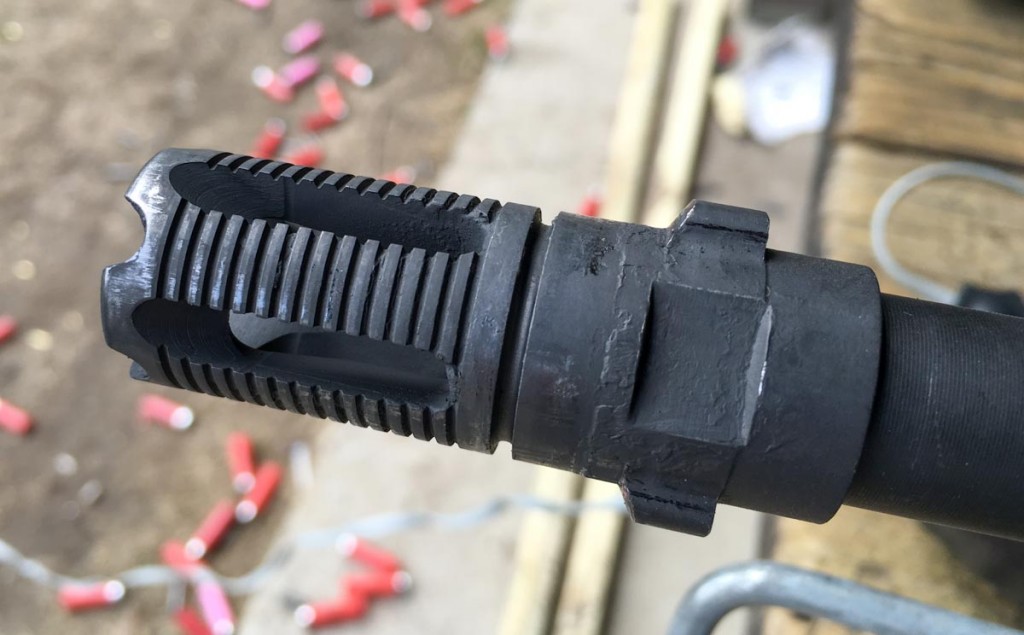 The Gemtech flash hider - well used a you can see from this photo!