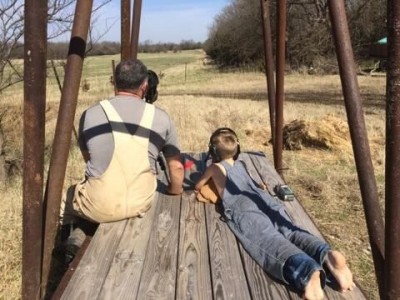 Competitive shooter Ryan Muller with his nephew, doing a little long range shooting in Kansas. 