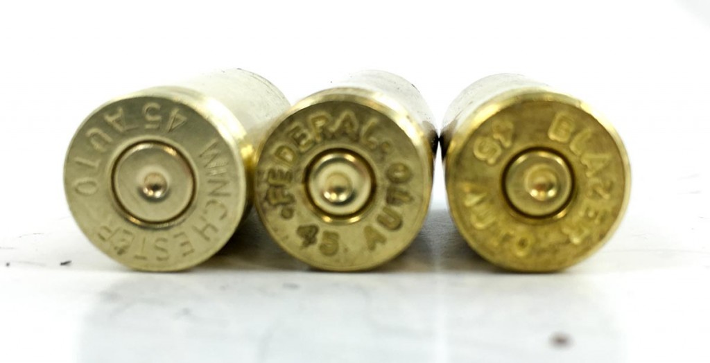 Keep an eye out for brass with the "wrong" primer sizes like these two on the right. Even though they are .45 ACP cases, they have small pistol primer pockets. You can reload them, you just don't want to mix them in the same batch as regulars when adding new primers.