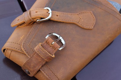 The straps and buckles hold everything secure for transportation or storage. 