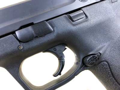 The controls are simple - takedown lever, slide lock and magazine release. The magazine release can be flipped to the other side if you like.