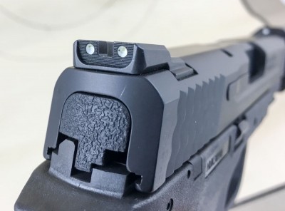The rear sight is a ramped two dot variety. Both front and rear are installed via dovetail cuts and can be changed. 