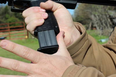 Hit the mag like you would when stripping a stuck mag and it pops free. 