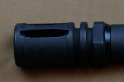 A2 flash suppressor with crush washer is standard fare 