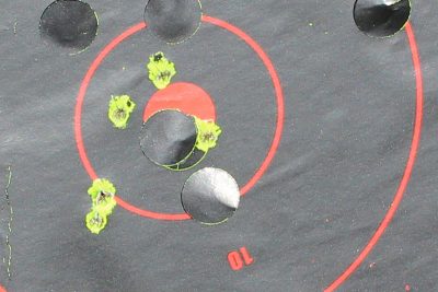 Five from 100. The group spread out, but this is from rimfire with peep sights, and is damn solid shooting.