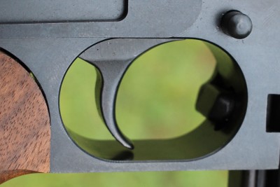 The trigger is solid, and breaks at 4 pounds.