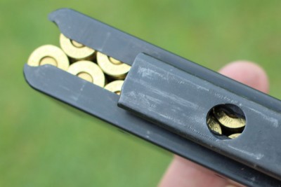 The round hole is catches the mag release.