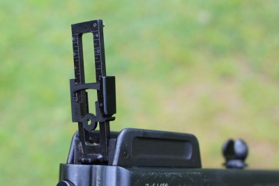 The rear sight can elevate for serious yardage. 