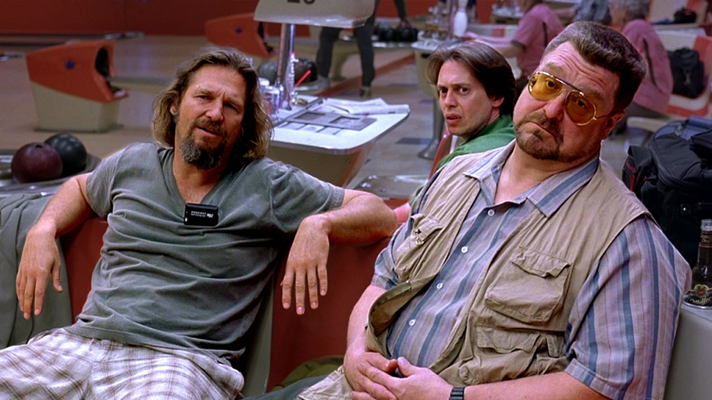 Walter Sobchak, right, in his Shoot-Me-First vest. 