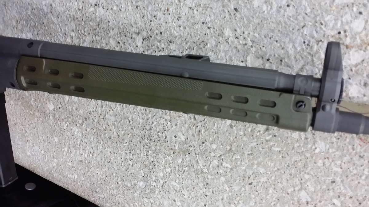 The green color of the slimline forend complements the matte gray of the Parkerized steel on the PTR-91 GI model. 