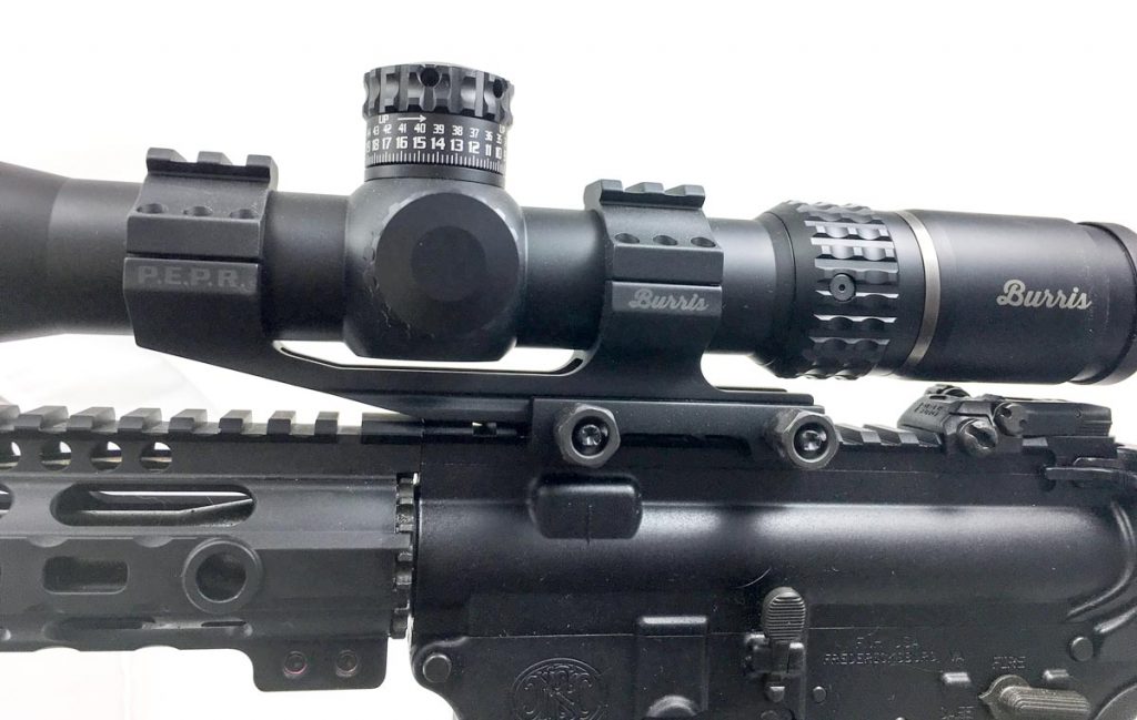 When putting a scope on an AR, you'll usually want offset mounts like this Burris AR P.E.P.R. Mount.