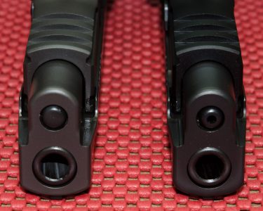 The solid steel guide rod of the Legion (left) adds weight and rigidity out front versus the standard P226 hollow steel rod (right).