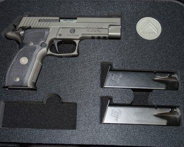 The case is custom fit to each model and has a place for the coin and available knife. 