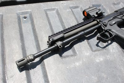 The gas tube sits about where it would on a carbine length AR, but this system is adjustable.