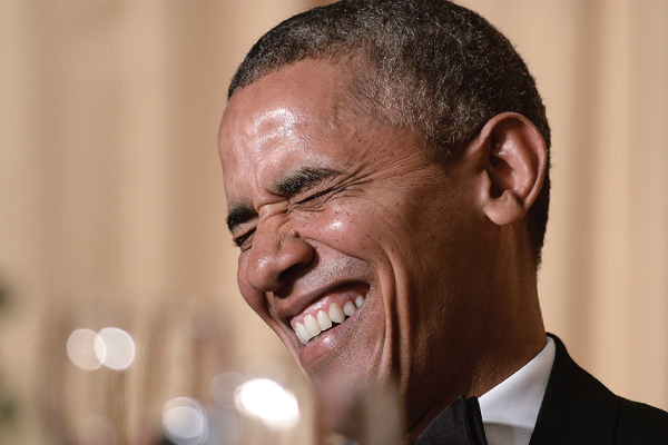 President Obama. Laughing. (Photo: UPI/Olivier Douliery/Pool)