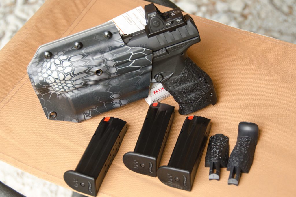 The Q5 Match comes standard with three 15-round magazines. Note the included interchangeable backstraps for customizing the grip. 