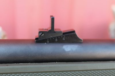 Rear sight is adjustable for elevation. 