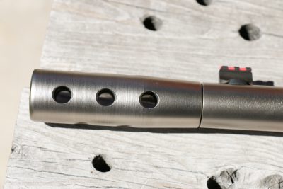 The threaded muzzle of the Ridge Runner is topped off with an effective muzzle brake. Note the fiber-optic front sight.