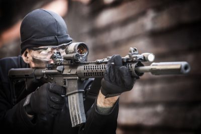 A 1X reflex sight like the Trijicon SRS (shown) offers unmatched CQB capabilities in engaging threats quickly. However, a variable power optic like the company's VCOG can extend out a firearms usable range. Image courtesy of Trijicon.