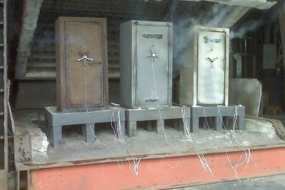 Shown here is a fire test of be performed. Note the smoke coming from safe numbers two and three (from left). Image courtesy of Liberty Safe.