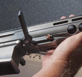 DRD Tactical Takedown Kivaari Semi-Auto .338 Lapua Magnum TAKEDOWN STEP 6: Push the pin in by hand. It should lock in place with thumb pressure.
