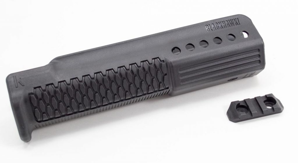 The forend has mounting positions for rail segments on both sides so you can add lights or lasers. 