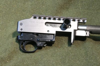 The receiver of the MagnumLite rifle features an integral strip of rail for attaching optics.