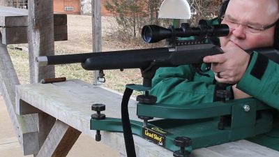 The author sights in his terrorist hunter rimfire on the range. 