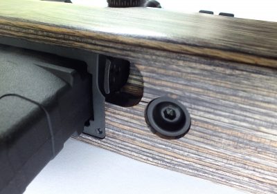 The magazine release is recessed into the stock and worked surprisingly well. Magazine fit was snug and felt precise. Notice the hollow-head guard screws. 