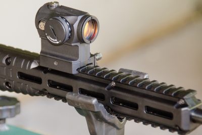 The author fitted an Aimpoint H1 on the carbine's plastic rail. 