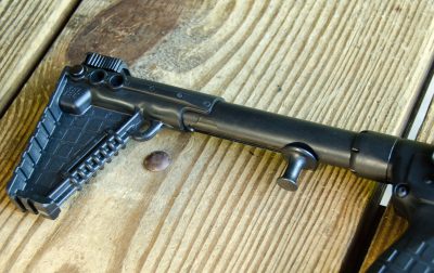 The carbine buttstock's length of pull has three adjustments. 