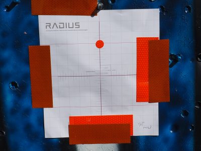 The small reflective dot represents the aiming point for the visible laser on the Radius during setup. 