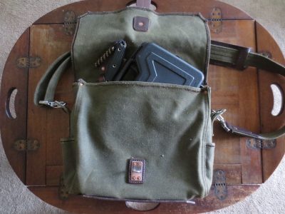 You can see the small outside pocket near the bottom of the bag. There's two of these on the inside as well. 