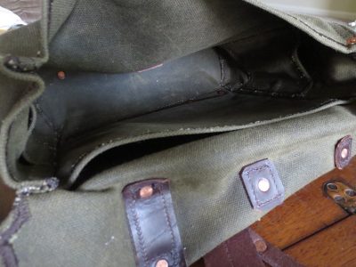 The inside of the bag is divided into two pockets. There are also two small pockets in the corner, which may be ideal for putting in a flashlight or pocket knife. 