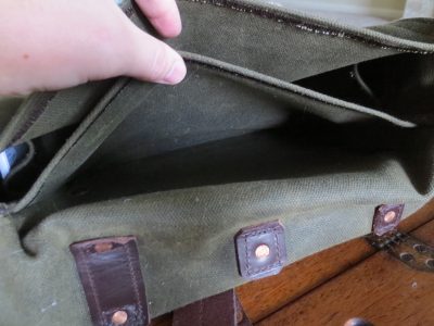 The smaller big pocket is where I put my MacBook Air. Fits perfectly. 