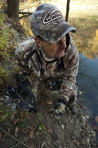 Check the soft soils along pond and creek banks for tracks and deer crossings, identifying where might be the best place to set up.
