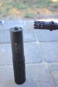 The author swapped out the standard muzzle device with a GEMTECH quickmount with the ONE suppressor. 