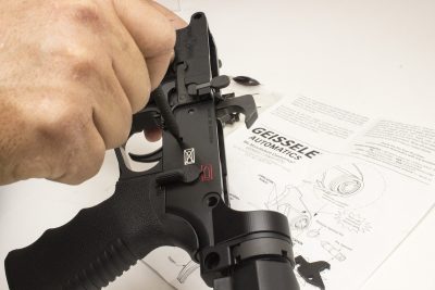 STEP 3: Remove existing trigger assembly and clean receiver. Note: It is not necessary to remove the safety selector, however the safety selector must be in the FIRE position so the G2S will fit underneath the safety selector. 
