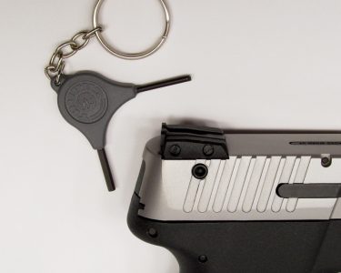 Taurus includes two keychain tools with the PT 111. The flat blade is used to adjust the windage and elevation screws on the rear sight. The other tool is used to activate the Taurus Security System located on the slide directly below the rear sight.
