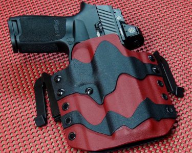 The only holster the author knows for sure is available is this "Torn Kydex" model from Multi Holsters. It is a perfect fit, and a nice fashion statement. 