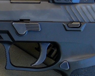 Improvements to the P320 include a flat takedown lever and a smaller slide stop. 