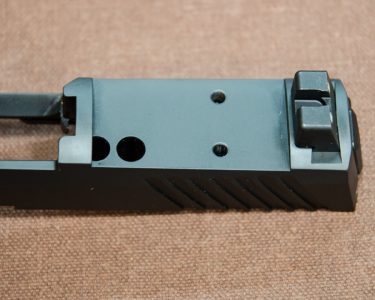 The author would like to see a protective slide cover plate supplied with the P320RX.