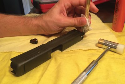 Dead Ringer’s Snake Eyes Pistol Sights -- Installation and Review The front sight slid in easily using the hammer and brass punch.